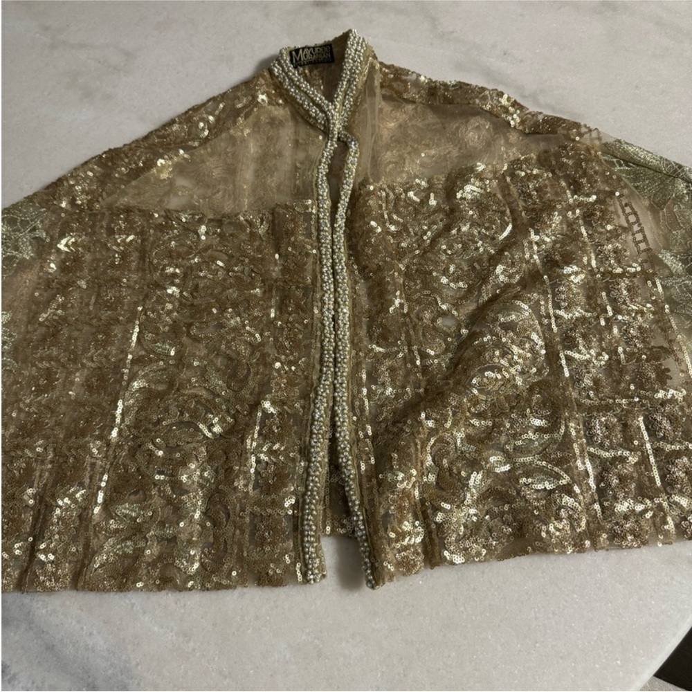 Gold cape